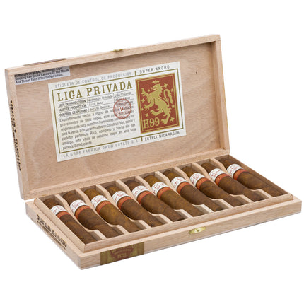 Open wooden humidor with cigars and Liga Privada label on a white background